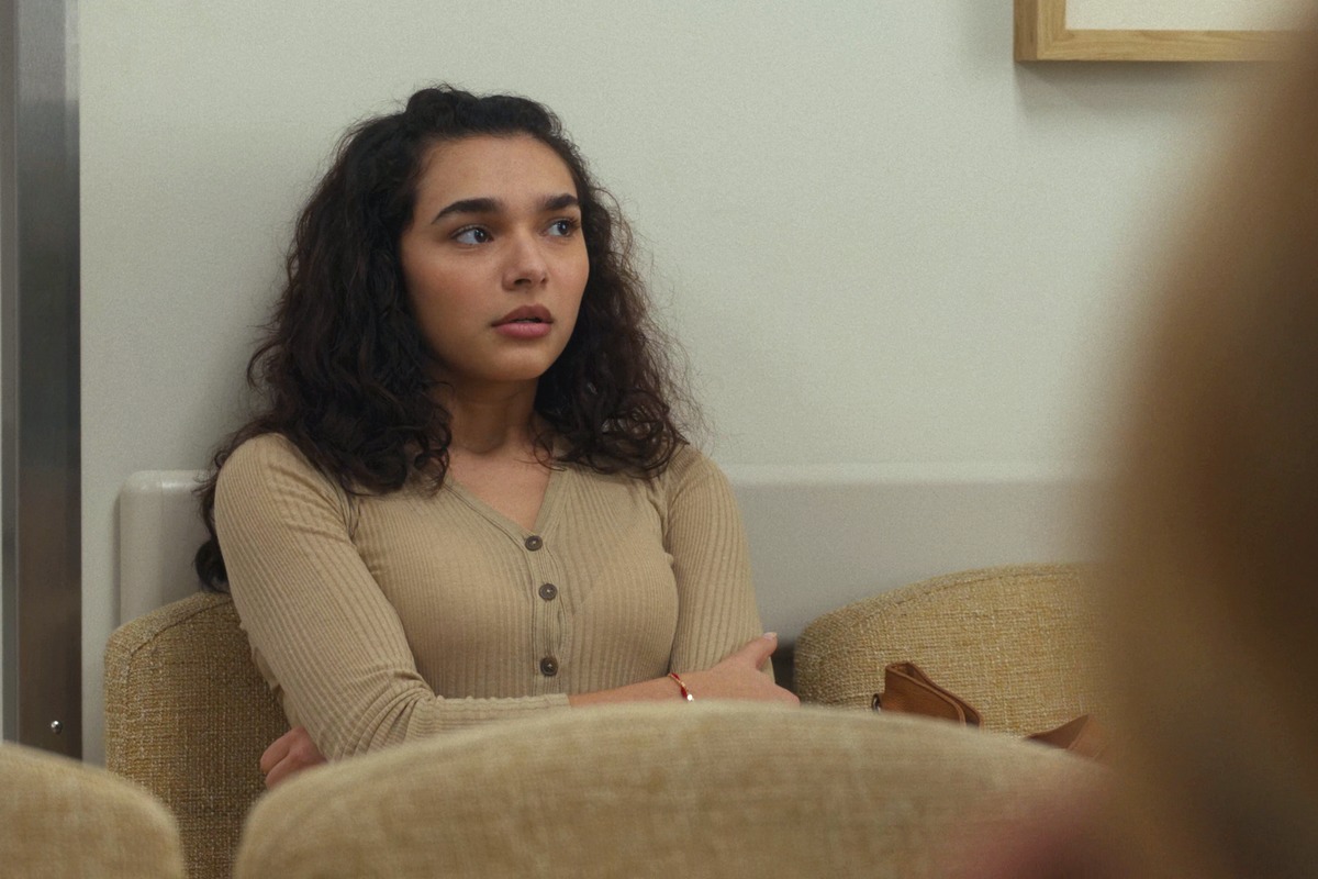 Ariana Medina's tan shirt on Landman